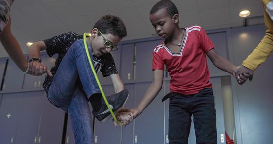 A group activity during TeamUp at School for refugee children like Mohammed_War Child_2010XX