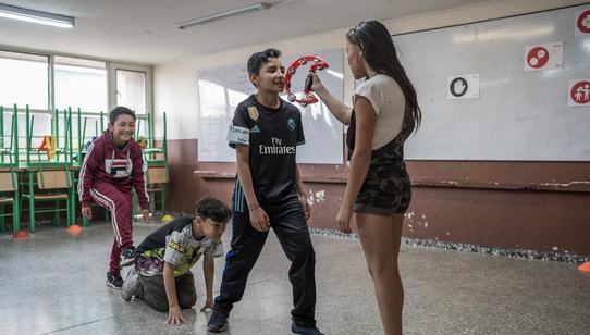 Venezuelan children playing  at TeamUp_War Child Colombia_190315