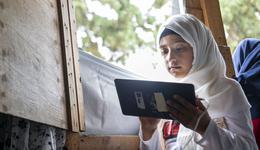 Girl Laila learns through tablet education in Lebanon_Can't Wait to Learn_War Child_200802